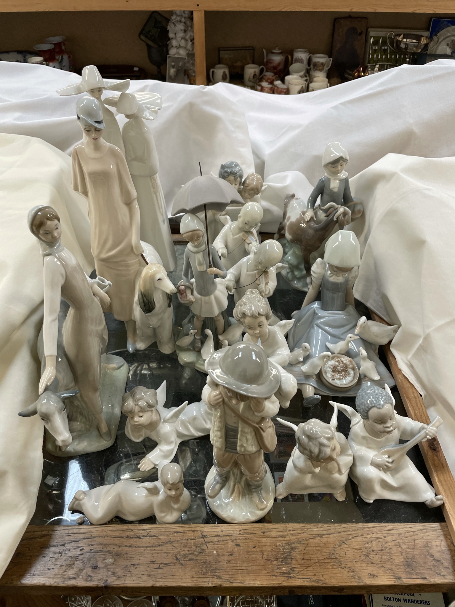A Lladro figure of two nuns together with a collection of Lladro,