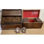 A Victorian mahogany tea caddy of rectangular form with two lidded compartments to the interior