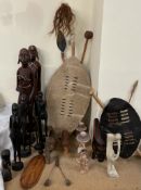 African carved figures, together with shield,