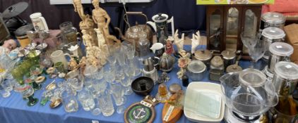 Storage jars, together with a copper kettle, resin figures,