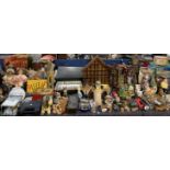 An extensive lot, including a bronzed resin figure, torches, anniversary clock,