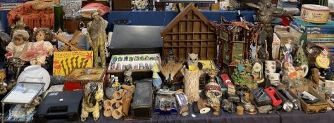 An extensive lot, including a bronzed resin figure, torches, anniversary clock,