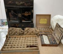 A Japanese laquer cabinet, together with metal bodied rubber faced type printing blocks,