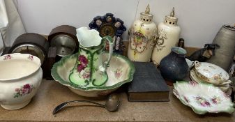 A pottery jug and basin set together with pottery clock, pottery vases, mantle clocks, Welsh bible,