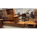 A G-Plan teak wall unit, together with a matching drinks cabinet, a teak side board,