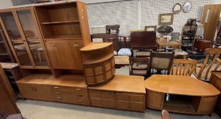 A G-Plan teak wall unit, together with a matching drinks cabinet, a teak side board,