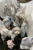 Five assorted Lladro figures and a Lladro plaque together with Nao and other figures