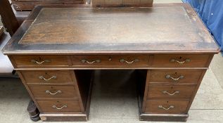 An Edwardian walnut pedestal desk,