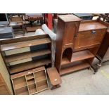 An early 20th century oak bureau together with a bookcase,