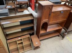 An early 20th century oak bureau together with a bookcase,