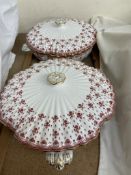 A pair of Spode tureens and covers decorated with flowers and leaves