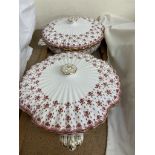 A pair of Spode tureens and covers decorated with flowers and leaves