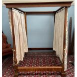 A mahogany four poster bed,