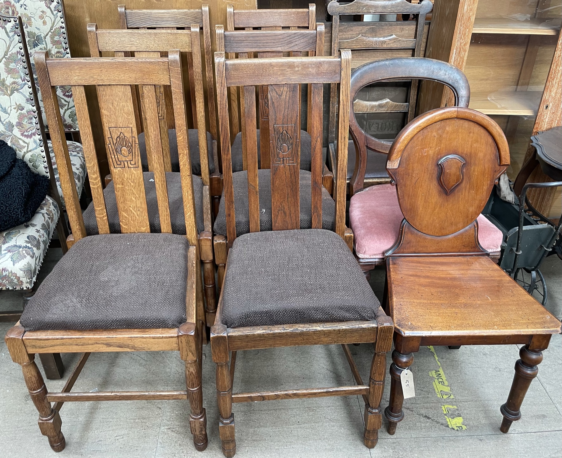 A set of six oak dining chairs together with a Victorian mahogany hall chair and two other chairs