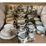 A Japanese porcelain part tea and dinner service together with assorted commemorative china