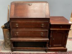 A 20th century oak bureau together with a brass umbrella stand, parasol,