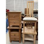 Two oak bedside cabinets together with a coffee table and a dining chair