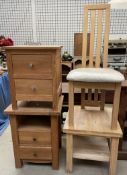 Two oak bedside cabinets together with a coffee table and a dining chair