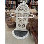 A white painted cast iron stick / umbrella stand