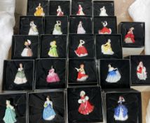 A collection of twenty two Royal Doulton miniature ladies,