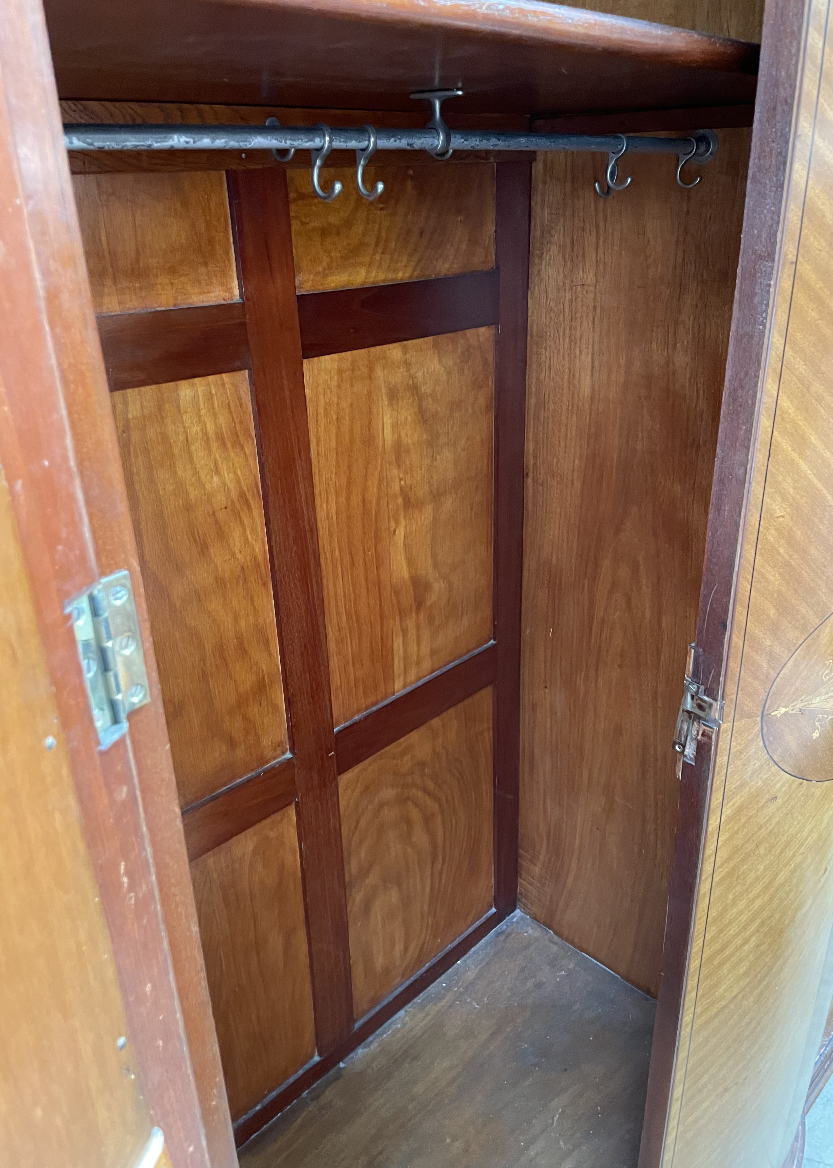 An Edwardian mahogany wardrobe, the moulded cornice above two mirrored doors on ball feet, - Image 4 of 4