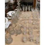Glass decanters, together with tumblers,