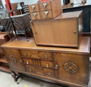 A 20th century oak sideboard together with a sewing box, record cabinet,