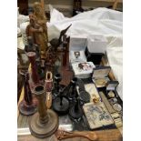 An Ebony part dressing table set, together with wooden candlesticks, wooden figurines, photo frame,