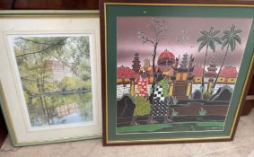 A Framed batik of a colourful street scene together with a print