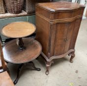 A mahogany two tier tripod table with a graduated top on a turned column and tripod base together