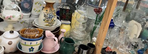 A large lot including storage jars, jardinieres, vases, drinking glasses,