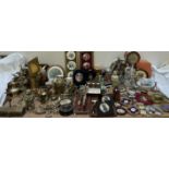 A pair of silhouettes together with assorted decorative miniatures, brass wares, tins, crucifixes,