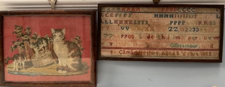 A mid 19th century alphabet sampler together with a woolwork of a cat and kittens