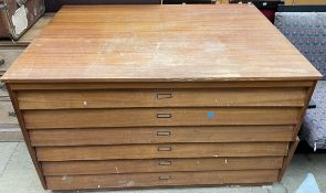 A teak folio chest with six drawers