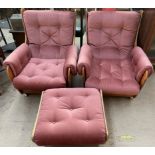 A pair of mid 20th century G-Plan teak and upholstered armchairs with matching footstool