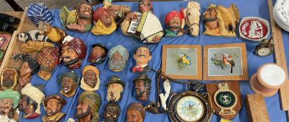 A collection of Bossons wall plaques together with a clock,