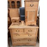 A pine chest with two short and two long drawers on a shaped base together with a pine bedside