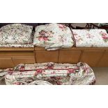A pair of curtains 127" wide with a 99" drop with swag and tail pelmet,