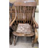 A Victorian slat back kitchen chair with central vase splat,