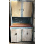 A mid 20th century metal kitchen cupboard,