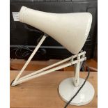 A white painted anglepoise lamp