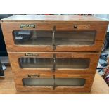 A Peter Pan Bodices shop display cabinet with three glazed drawers