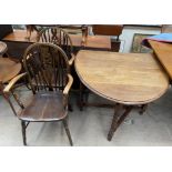 A 20th century oak gateleg dining table on barley twist legs,