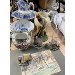 A blue and white jug and basin set together with pottery jugs, bowls, Lilliput lane cottages, W.