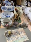 A blue and white jug and basin set together with pottery jugs, bowls, Lilliput lane cottages, W.