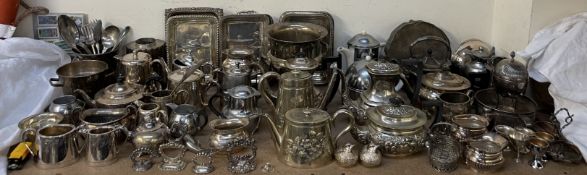 A large quantity of electroplated wares including tureens and covers, ice buckets, part tea sets,