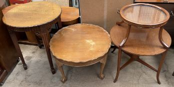 An Edwardian mahogany two tier tray topped occasional table on square tapering legs together with a