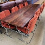 A mid 20th century walnut and chrome dining table,