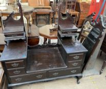 An Edwardian mahogany dressing table on cabriole legs