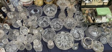 Cut glass bowls, together with decanters, storage jars,